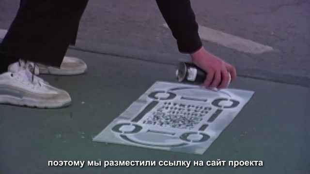 Video Reference: Grey, Office equipment, Gadget, Space bar, Electronic instrument, Font, Walking shoe, Human leg, Asphalt, Road surface