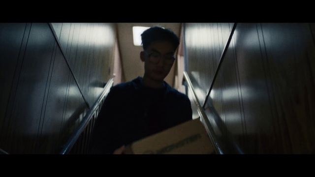 Video Reference: Glasses, Flash photography, Audio equipment, Tints and shades, Eyewear, Event, Formal wear, Darkness, Facial hair, Automotive window part