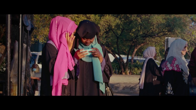 Video Reference: Flash photography, Luggage and bags, Bag, Entertainment, Pink, Happy, Adaptation, Performing arts, Magenta, Handbag