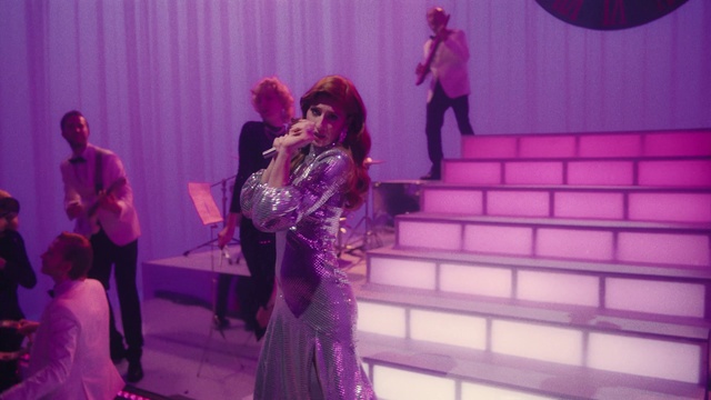 Video Reference: Purple, Violet, Entertainment, Pink, Performing arts, Dance, Hat, Magenta, Curtain, Music