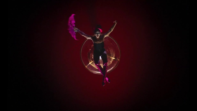 Video Reference: Arm, Human body, Flash photography, Purple, Performing arts, Entertainment, Athletic dance move, Aerialist, Stunt performer, Magenta