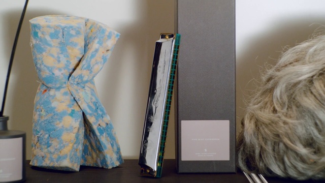 Video Reference: Rectangle, Textile, Wood, Grey, Material property, Art, Font, Curtain, Eyelash, Chair