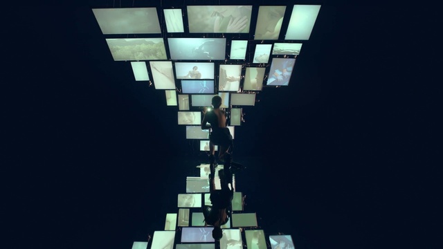 Video Reference: Rectangle, Building, Fixture, Material property, Symmetry, Tints and shades, Parallel, Wood, Urban design, Glass