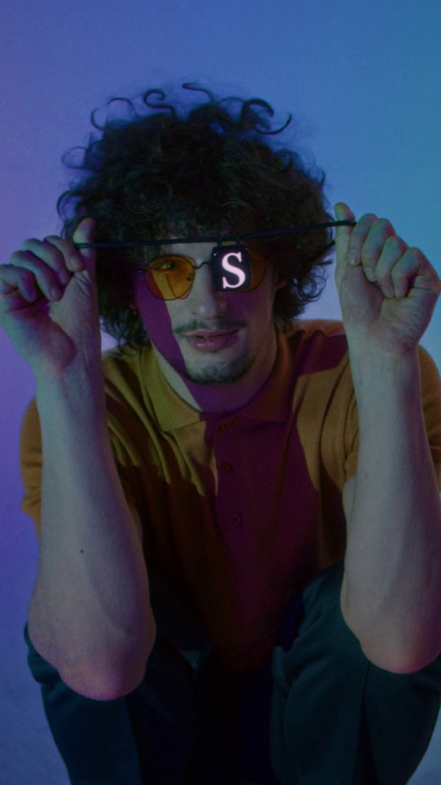 Video Reference: Glasses, Hairstyle, Vision care, Goggles, Human body, Happy, Sunglasses, Gesture, Flash photography, Eyewear
