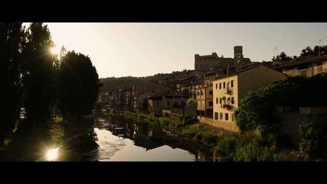 Video Reference: Water, Sky, Building, Atmosphere, Light, Window, Plant, Natural landscape, Tree, Dusk