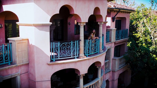 Video Reference: Building, Window, Azure, Architecture, Pink, Neighbourhood, Wall, Residential area, Tree, Material property