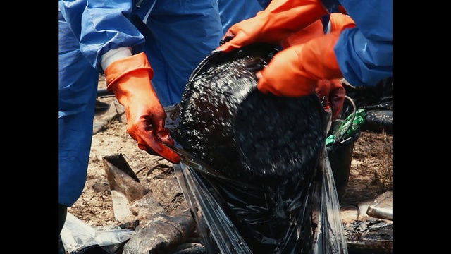 Video Reference: Hand, Safety glove, Automotive tire, Glove, Elbow, Gas, Workwear, Wrist, Soil, Electric blue