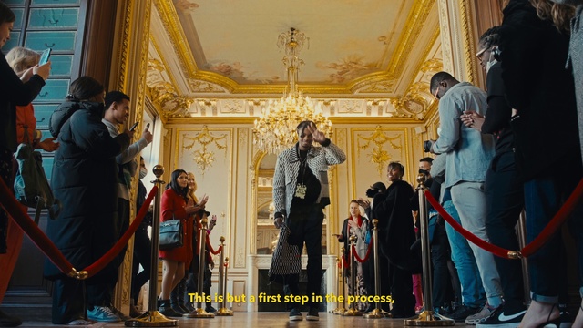 Video Reference: Yellow, Art, Event, City, Fashion design, Leisure, Performance art, History, Tradition, Visual arts