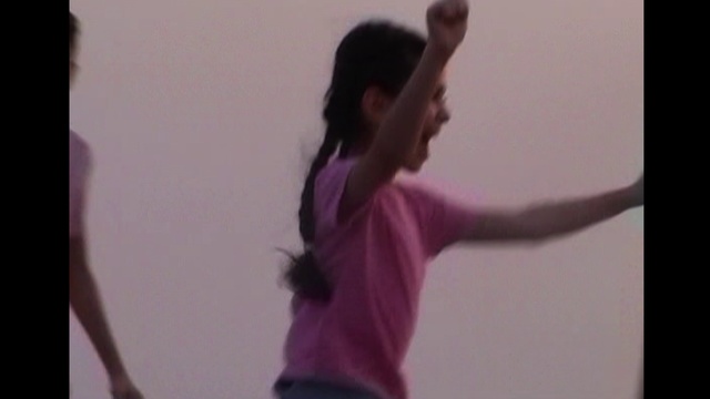 Video Reference: Sleeve, Purple, Gesture, Happy, Elbow, Magenta, Entertainment, Performing arts, Dance, Event