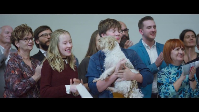 Video Reference: Smile, Happy, Flash photography, Iris, Gesture, Companion dog, Event, Fun, Formal wear, Dog breed