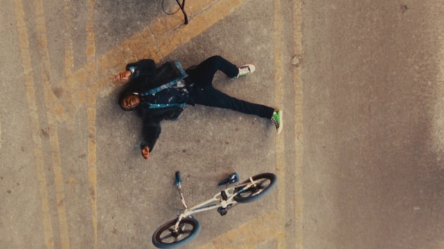 Video Reference: Wheel, Bicycle, Tire, Sports equipment, Bicycle wheel, Rolling, Asphalt, Automotive tire, Stunt performer, Street stunts