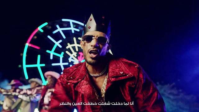 Video Reference: Purple, Sunglasses, Vision care, Music, Eyewear, Music artist, Entertainment, Hat, Artist, Performing arts