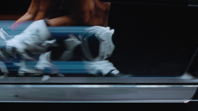 Video Reference: Gesture, Window, Human leg, Electric blue, Foot, Windshield, Carmine, Wrist, Art, Vehicle door