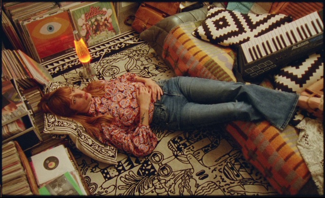 Video Reference: Textile, Wood, Orange, Art, Flooring, Comfort, Musical keyboard, Musical instrument, Pattern, Couch