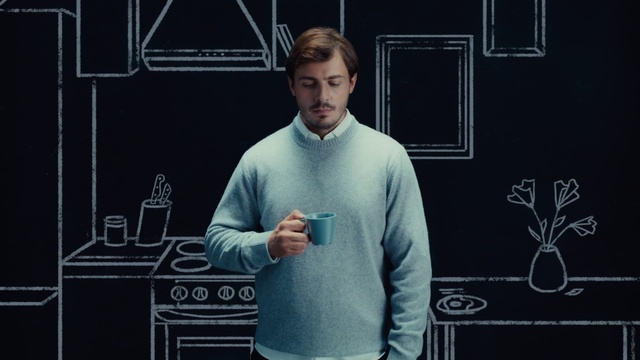 Video Reference: Sleeve, Gesture, Flash photography, Font, T-shirt, Blackboard, Elbow, Audio equipment, Event, Electric blue