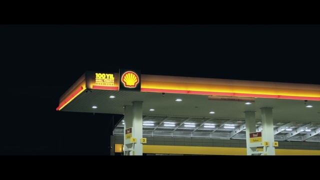 Video Reference: Gas, Font, Building, Electricity, Midnight, Electronic signage, Signage, Automotive lighting, Sign, Logo