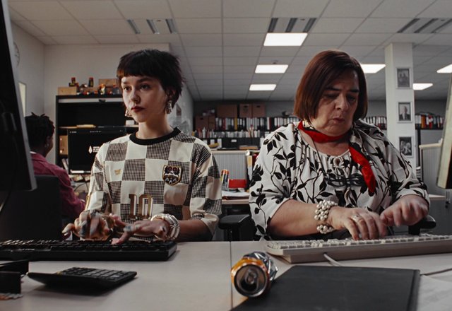 Video Reference: office, desks, typing, computers, workspace, indoor, employees, keyboard, documents, fluorescent lighting, administration, cubicle, casual clothing, meeting room, professional