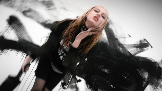 Video Reference: Lip, Flash photography, Fashion, Style, Leather jacket, Thigh, Black hair, Jacket, Long hair, Happy