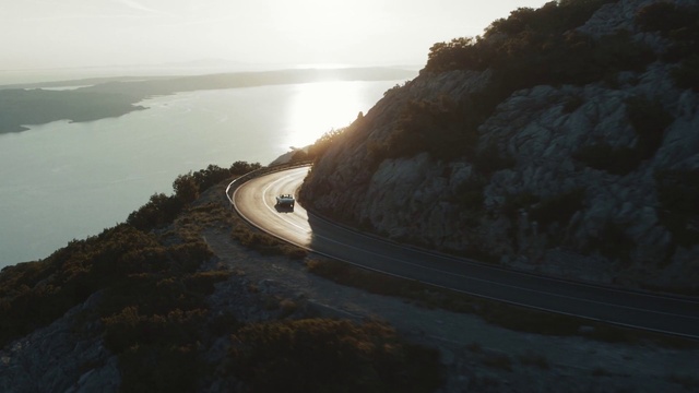Video Reference: Water, Water resources, Sky, Cloud, Asphalt, Road surface, Natural landscape, Highland, Watercourse, Coastal and oceanic landforms