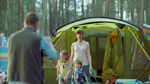 Video Reference: Shorts, Vertebrate, Tent, Tree, Camping, Mammal, Leisure, Community, Grass, Fun