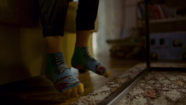 Video Reference: Footwear, Shoe, Leg, Dress, Textile, Wood, Standing, Orange, Flooring, Finger