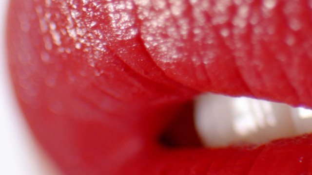 Video Reference: lips, mouth, teeth, closeup, macro, red, face, blurred, shallow depth of field, human skin