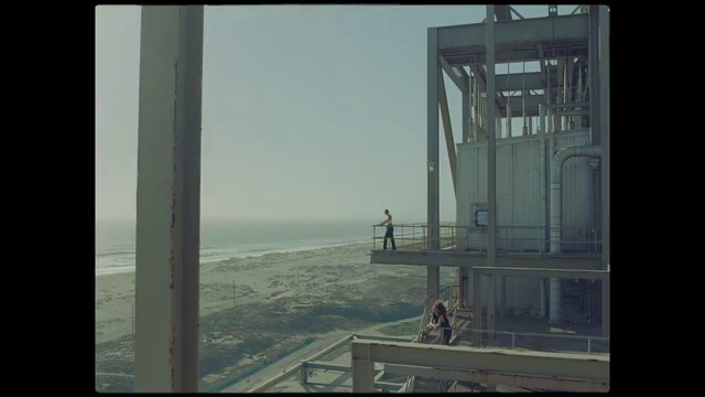 Video Reference: Water, Sky, Building, Window, Urban design, City, Glass, Facade, Horizon, Rectangle