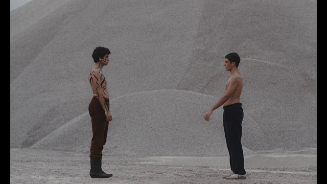 Video Reference: Leg, Sleeve, Standing, Gesture, Grey, Landscape, Travel, Street fashion, Fun, Sand