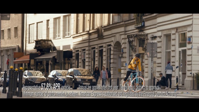Video Reference: Land vehicle, Bicycle, Vehicle, Building, Window, Wheel, Mode of transport, Urban design, Car, Font