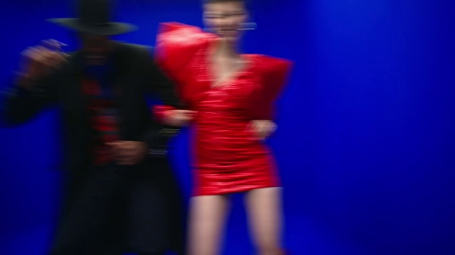 Video Reference: Sheath dress, One-piece garment, Blue, Dress, Purple, Day dress, Gesture, Entertainment, Waist, Choreography