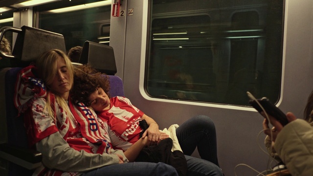 Video Reference: Train, Jeans, Human, Public transport, People, Passenger, Window, Vehicle, Snapshot, Event