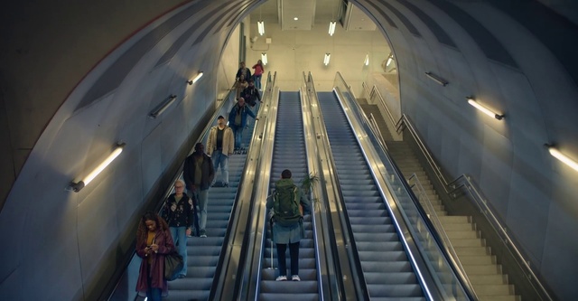 Video Reference: Escalator, Stairs, Building, Architecture, Symmetry, City, Metropolitan area, Handrail, Event, Fun