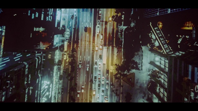 Video Reference: Building, Automotive lighting, Font, Line, Cityscape, Tints and shades, City, Metropolis, Entertainment, Darkness