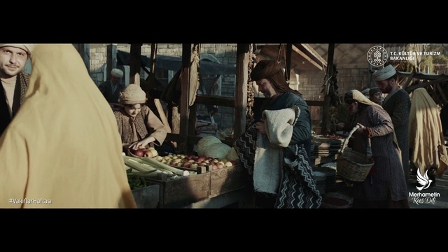 Video Reference: Hat, Event, Art, Darkness, Visual arts, Conversation, City, Street, Font, Still life photography