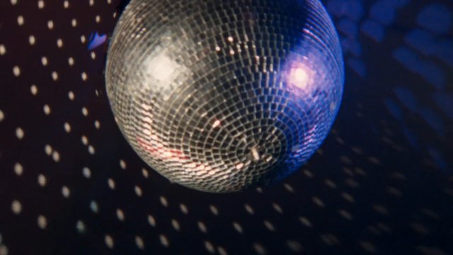 Video Reference: disco ball, mirror ball, party, nightclub, dance, reflective, close-up, glamour, lights, ceiling, event, celebration