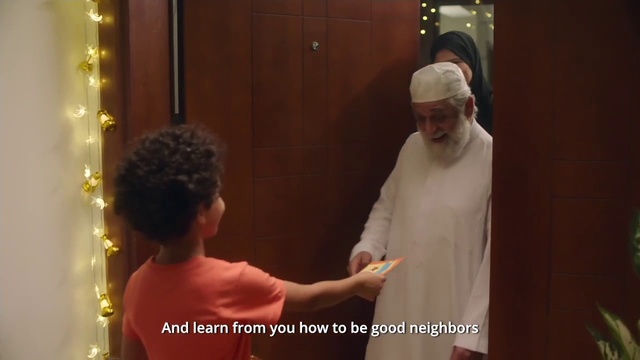 Video Reference: Gesture, Event, Happy, Rite, T-shirt, Religious institute, Conversation, Font, Tradition, Cope