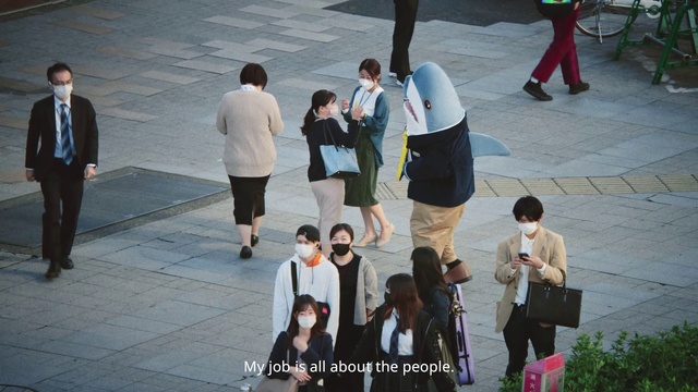 Video Reference: Trousers, Outerwear, Photograph, White, Black, Temple, Standing, Gesture, Street fashion, Travel