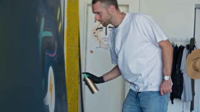 Video Reference: Joint, Shoulder, Watch, Gesture, Art, Vehicle door, Beard, Elbow, Event, Electric blue