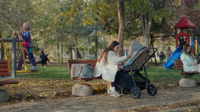 Video Reference: Wheel, Plant, Tire, People in nature, Tree, Dress, Woody plant, Adaptation, Happy, Leisure