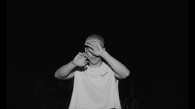 Video Reference: Arm, Human body, Flash photography, Gesture, Entertainment, Elbow, T-shirt, Performing arts, Music, Event