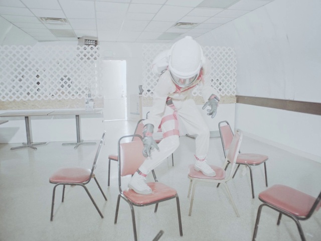 Video Reference: Chair, Floor, Table, Flooring, Space, Art, Service, Event, Visual arts, Machine