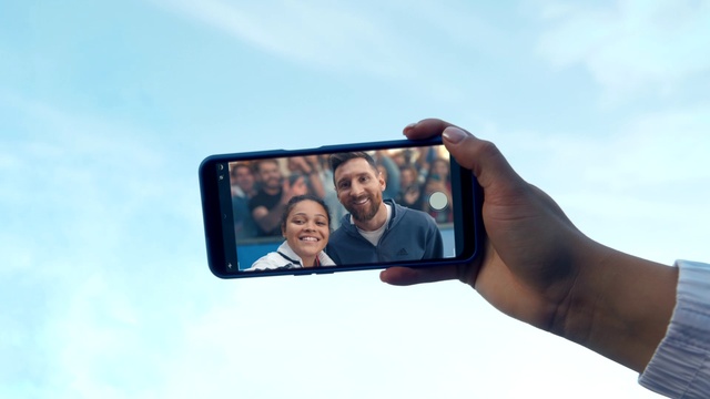 Video Reference: Sky, Mobile phone, Automotive mirror, Communication Device, Smile, Portable communications device, Gesture, Gadget, Tree, Cloud