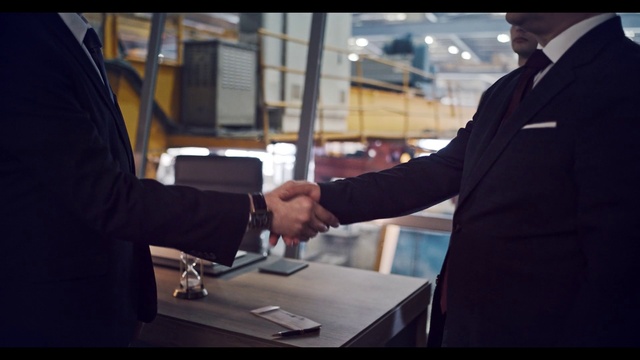 Video Reference: Sleeve, Gesture, Automotive design, Blazer, Hat, Engineering, Cap, Event, White-collar worker, Formal wear