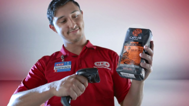 Video Reference: Hand, Smile, Gesture, Finger, Gadget, Recreation, Beverage can, Drink, Aluminum can, Games