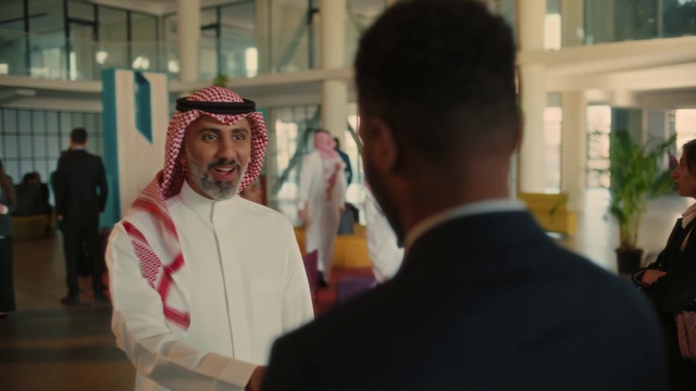 Video Reference: Temple, Gesture, Beard, Event, Formal wear, Suit, Tradition, Fashion design, Tie, Uniform