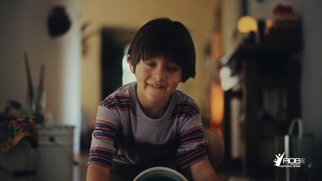 Video Reference: Smile, Flash photography, Sleeve, Happy, Fun, T-shirt, Sitting, Bangs, Audio equipment, Toddler