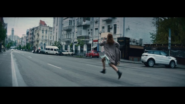 Video Reference: Car, Land vehicle, Building, Tire, Wheel, Vehicle, Road surface, Asphalt, Flash photography, Street fashion