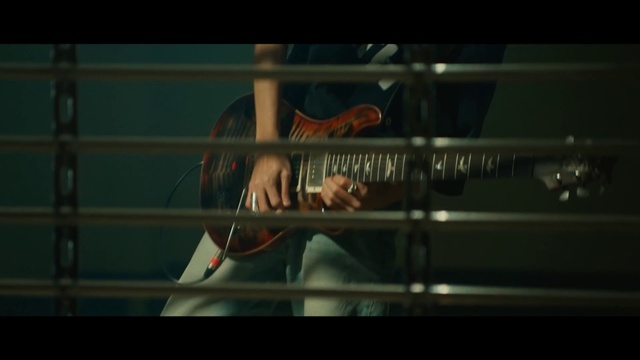 Video Reference: Guitar accessory, Font, Automotive exterior, Music, Musical instrument, Vehicle door, Event, Darkness, String instrument, Metal