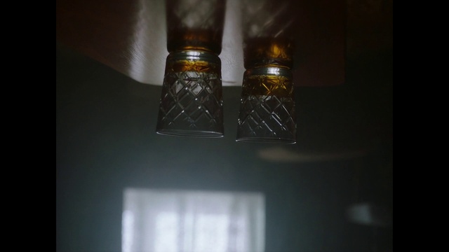 Video Reference: Lamp, Light bulb, Amber, Wood, Tints and shades, Facial hair, Gas, Chandelier, Compact fluorescent lamp, Ceiling fixture