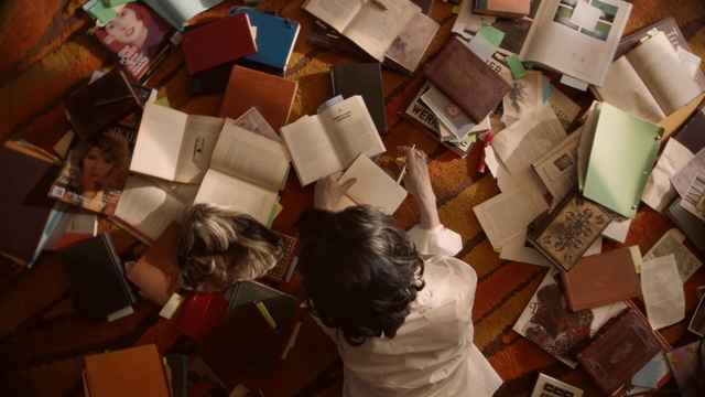 Video Reference: Wood, Social group, People, Event, Space, Cardboard, Youth, Font, Pattern, Art